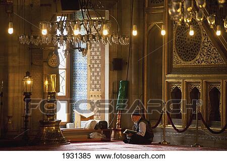 Turkey, Man Reading Qaran or Koran in New Mosque; Istanbul View Large Photo Image Stock Photography - Turkey, Man Reading Qaran or Koran in New Mosque; Istanbul. Fotosearch