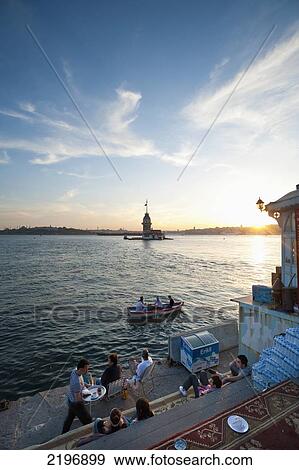 Turkey, opposite Leander's Tower; Istanbul, People watching sunset on Eastern shore View Large Photo Image Stock Photo - Turkey, opposite Leander's Tower; Istanbul, People watching sunset on Eastern shore. Fotosearch