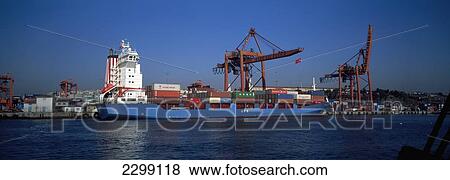 Stock Photo - Turkey, Panoramic Shot Of Container Ship Being Unloaded Istanbul Docks; Istanbul. Fotosearch