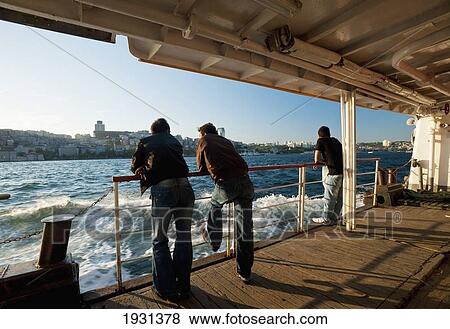 Stock Photo - Turkey, People on Ferry Crossing Bosphorus; Istanbul. Fotosearch