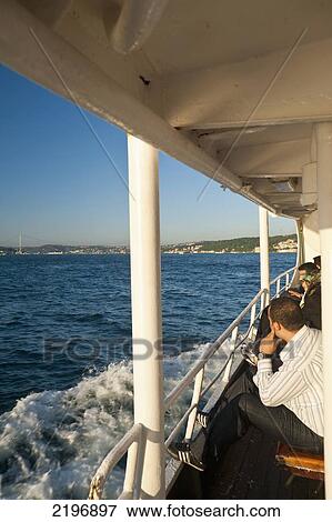 Turkey, People on ferry crossing Bosphorus; Istanbul View Large Photo Image Stock Photo - Turkey, People on ferry crossing Bosphorus; Istanbul. Fotosearch