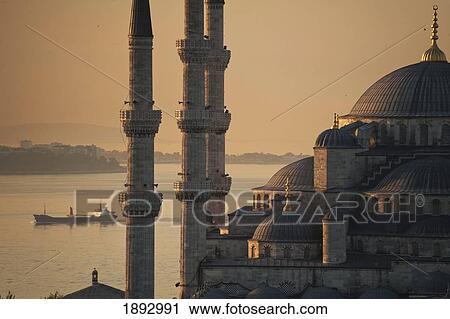 Turkey, Ship sailing along Bosphorus behind Sultanahmet or Blue mosque at dawn; Istanbul View Large Photo Image Stock Image - Turkey, Ship sailing along Bosphorus behind Sultanahmet or Blue mosque at dawn; Istanbul. Fotosearch