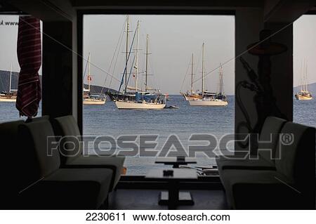 Turkey, View From Restaurant On Cumhuryet Cadessi Overlooking East Bay Beach And Gulet Boats Moored In Harbour; Bodrum View Large Photo Image Stock Image - Turkey, View From Restaurant On Cumhuryet Cadessi Overlooking East Bay Beach And Gulet Boats Moored In Harbour; Bodrum. Fotosearch