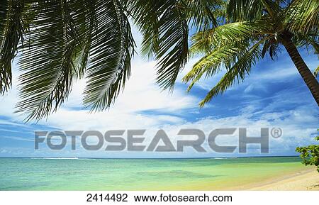 Stock Image - Turquoise water of the pacific ocean off the coast of Kauai; Kauai, Hawaii, United States of America. Fotosearch