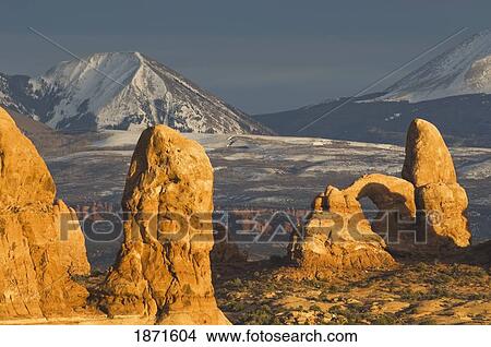 Turret Arch And Sandstone Formations At Sunset In Arches National Park; Utah, Usa View Large Photo Image Picture - Turret Arch And Sandstone Formations At Sunset In Arches National Park; Utah, Usa. Fotosearch