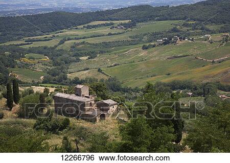 Stock Photograph - Tuscan countryside; Montepulciano, Val D'Orcia, Tuscany, Italy. Fotosearch