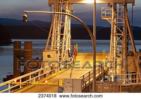 Stock Photo - Twilight Falls On The Ferry Dock At Village Bay; Mayne Island, British Columbia, Canada. Fotosearch