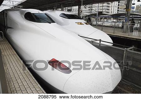 Two Bullet Trains From The Front In A Station; Tokyo, Japan View Large Photo Image Stock Photography - Two Bullet Trains From The Front In A Station; Tokyo, Japan. Fotosearch
