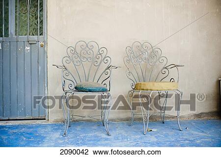 Two Chairs With Cushions Sitting Outside A Doorway; Yelapa, Jalisco, Mexico View Large Photo Image Stock Image - Two Chairs With Cushions Sitting Outside A Doorway; Yelapa, Jalisco, Mexico. Fotosearch