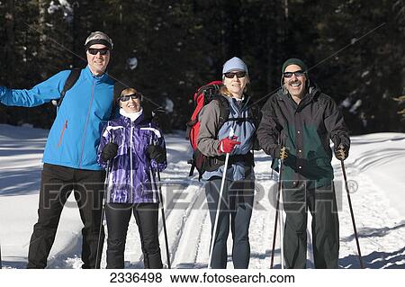 Two Couples Cross Country Skiiing On A Tracked Trail; Lake Louise, Alberta, Canada View Large Photo Image Stock Photo - Two Couples Cross Country Skiiing On A Tracked Trail; Lake Louise, Alberta, Canada. Fotosearch