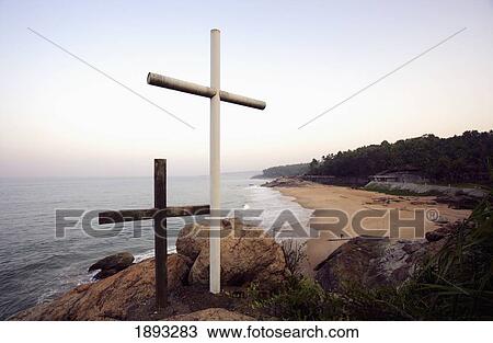 Stock Image - Two Crosses Standing Out Of A Rock Formation At The Malabar Coast.. Fotosearch