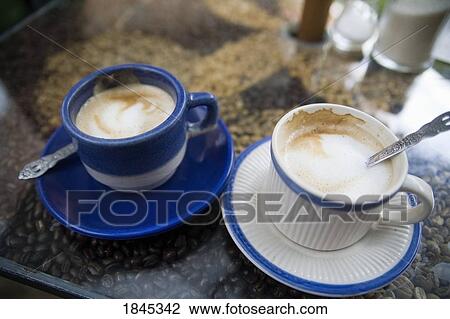 Two Cups Of Coffee On Bar Counter; Antigua, Guatemala View Large Photo Image Stock Image - Two Cups Of Coffee On Bar Counter; Antigua, Guatemala. Fotosearch