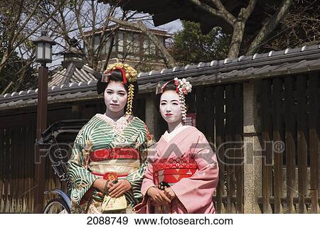 Two Geishas In Old Kyoto; Kyoto, Japan View Large Photo Image Stock Photo - Two Geishas In Old Kyoto; Kyoto, Japan. Fotosearch