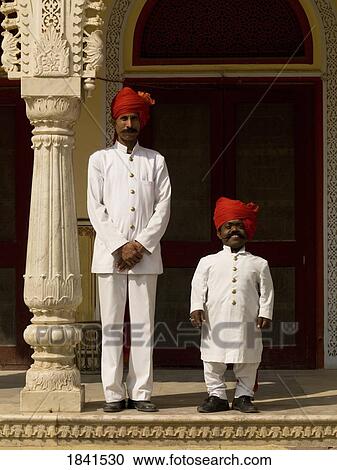 Stock Image - Two Gurads Standing; Jaipur, Rajasthan, India. Fotosearch