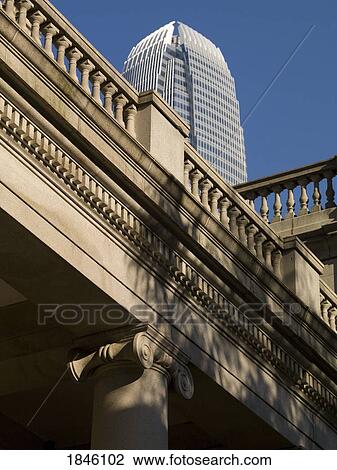 Stock Image - Two International Finance Centre Tower Behind Bridge; Hong Kong, China. Fotosearch