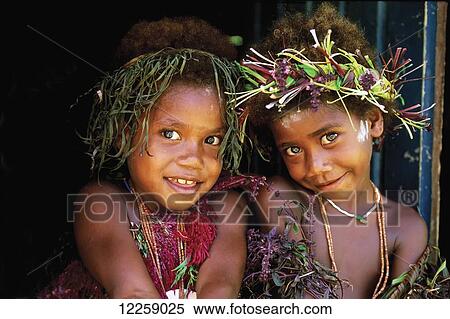 Two island girls posing; Trobriand Islands, Papua New Guinea View Large Photo Image Stock Photography - Two island girls posing; Trobriand Islands, Papua New Guinea. Fotosearch