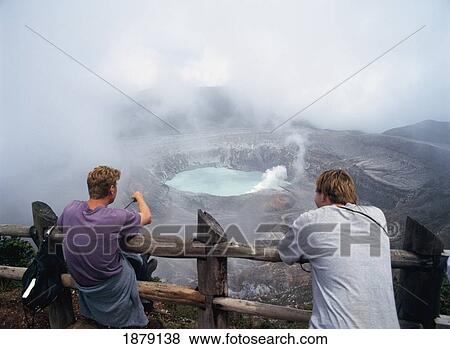 Stock Photo - Two Men At Poas Volcano. Fotosearch