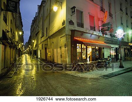 Two Men Outside A Cafe Before Dawn On Rue Montorgueil, Paris, France View Large Photo Image Picture - Two Men Outside A Cafe Before Dawn On Rue Montorgueil, Paris, France. Fotosearch