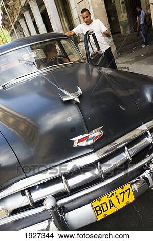 Two Men With Old American Yank Tank Car View Large Photo Image Picture - Two Men With Old American Yank Tank Car. Fotosearch