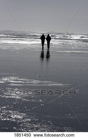 Two People Walking On The Beach View Large Photo Image Stock Image - Two People Walking On The Beach. Fotosearch