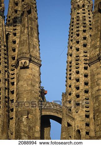 Two Towers Of A Building With A Walkway Connecting Them Against A Blue Sky View Large Photo Image Picture - Two Towers Of A Building With A Walkway Connecting Them Against A Blue Sky. Fotosearch