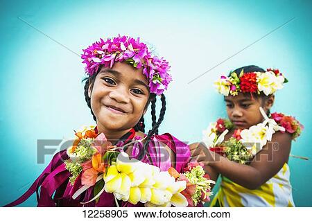 Two young girls in fresh floral garlands; Tuvalu View Large Photo Image Stock Photography - Two young girls in fresh floral garlands; Tuvalu. Fotosearch