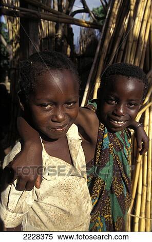 Stock Photography - Two Young Girls, Mwanza, Tanzania. Fotosearch