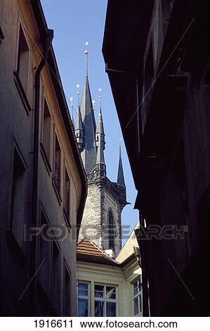 Stock Image - Tyn Church Spire From The Backstreets. Fotosearch