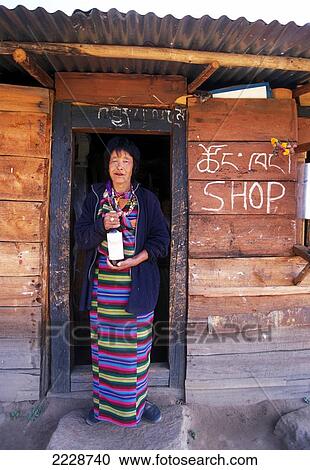Typical Shop And Owner With Whisky In Paro Valley Photo: Jill Mead Axiom View Large Photo Image Stock Image - Typical Shop And Owner With Whisky In Paro Valley Photo: Jill Mead Axiom. Fotosearch