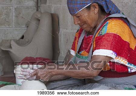 Stock Photograph - Tzeltal Maya Woman Potter Working The Clay, Amatenango Del Valle, Chiapas, Mexico. Fotosearch