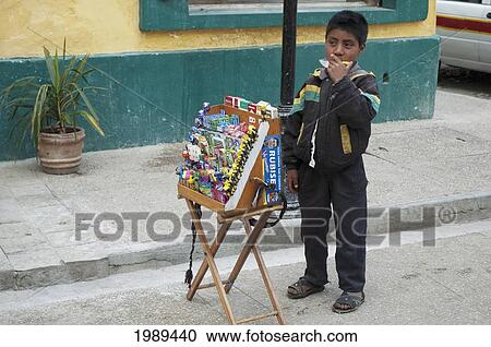 Tzotzil Maya Boy Selling Cigarettes And Candy, San Cristobal De Las Casas, Chiapas, Mexico View Large Photo Image Stock Image - Tzotzil Maya Boy Selling Cigarettes And Candy, San Cristobal De Las Casas, Chiapas, Mexico. Fotosearch