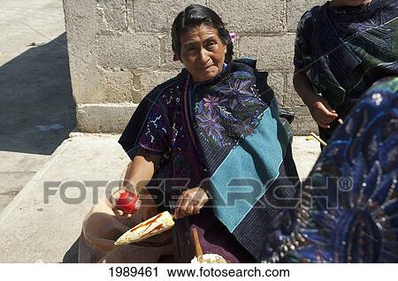 Tzotzil Maya Woman Preparing A Corn On A Cob, Zinacantan, Chiapas, Mexico View Large Photo Image Stock Image - Tzotzil Maya Woman Preparing A Corn On A Cob, Zinacantan, Chiapas, Mexico. Fotosearch
