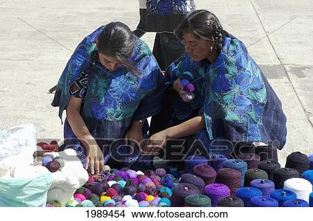 Picture - Tzotzil Maya Women Selling Yarns At The Market, Zinacantan, Chiapas, Mexico. Fotosearch