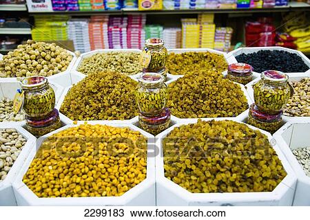 Stock Image - UAE, Al Raffa area of city centre; Dubai, Shop selling sweets and nuts. Fotosearch