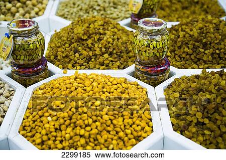 Stock Photography - UAE, Al Raffa area of city centre; Dubai, Shop selling sweets and nuts. Fotosearch