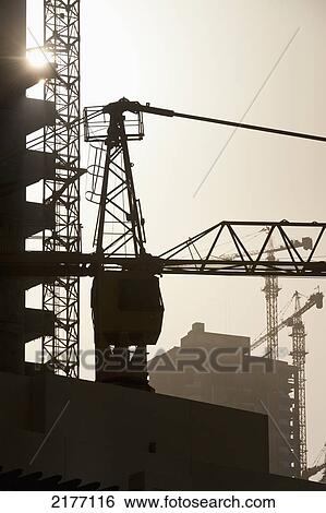 UAE, Construction cranes and buildings; Dubai View Large Photo Image Stock Photograph - UAE, Construction cranes and buildings; Dubai. Fotosearch