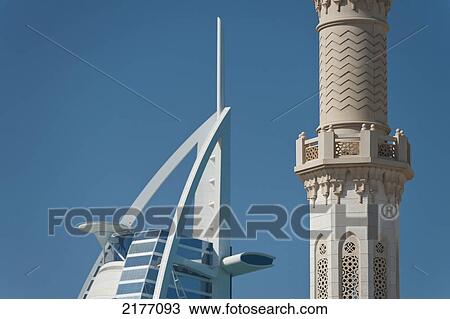 UAE, Detail of minaret of small mosque in front of Burj Al Arab hotel; Dubai View Large Photo Image Stock Image - UAE, Detail of minaret of small mosque in front of Burj Al Arab hotel; Dubai. Fotosearch
