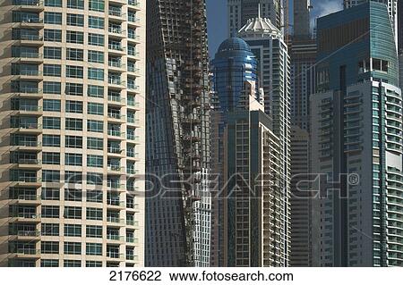 Stock Image - UAE, Dubai, Residential and office blocks built and under construction; Dubai Marina. Fotosearch