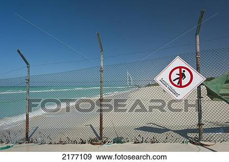 UAE, Fenced off beach with the Burj Al Arab in distance; Dubai View Large Photo Image Stock Photo - UAE, Fenced off beach with the Burj Al Arab in distance; Dubai. Fotosearch