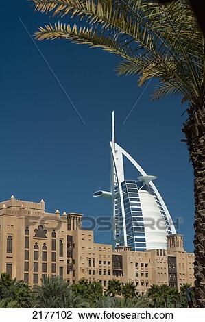 UAE, Madinat Jumeirah Hotel with the Burj Al Arab Hotel behind; Dubai View Large Photo Image Stock Image - UAE, Madinat Jumeirah Hotel with the Burj Al Arab Hotel behind; Dubai. Fotosearch