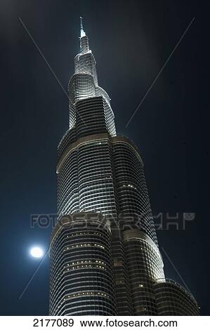 UAE, Moon behind Burj Khalifa at night; Dubai View Large Photo Image Stock Photo - UAE, Moon behind Burj Khalifa at night; Dubai. Fotosearch