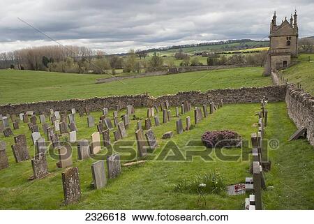 Stock Photo - UK, Cotswolds, North Cotswolds, Cemetery at St. James Baptist Church; Chipping Campden. Fotosearch