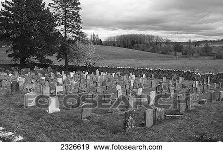 Stock Photo - UK, Cotswolds, North Cotswolds, Cemetery at St. James Baptist Church; Chipping Campden. Fotosearch