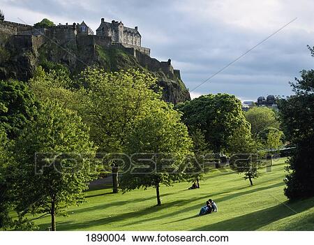 UK, Couple In Park below Edinburgh Castle; Scotland View Large Photo Image Picture - UK, Couple In Park below Edinburgh Castle; Scotland. Fotosearch