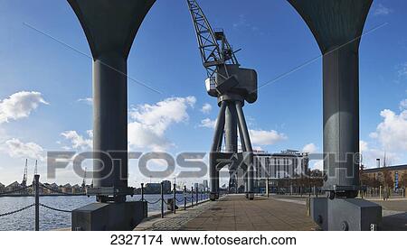 Picture - UK, Cranes at shipping docks in East London; London. Fotosearch