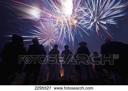 Stock Photo - UK, East Sussex, South Street Bonfire Society watching Nevill Junior Bonfire display; Lewes. Fotosearch