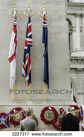 Stock Photo - UK, England, 11th of November 1920; London, used as a centrepiece to the Remembrance Day Parade which occurs on the closest Sunday to Armistice Day, The Cenotaph War Memorial in Whitehall. Fotosearch