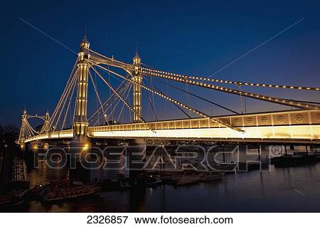 Stock Photo - UK, England, Albert Bridge at night; London. Fotosearch