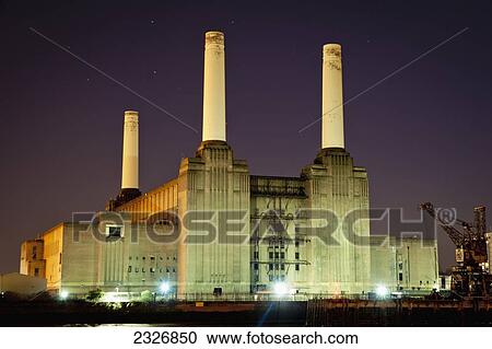 Stock Image - UK, England, Battersea Power Station at night; London. Fotosearch