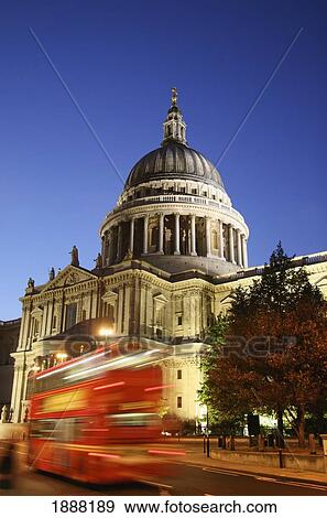 Stock Photo - UK, England, Blurred Motion; London, Red Double Decker Bus Passing St Paul's Cathedral. Fotosearch